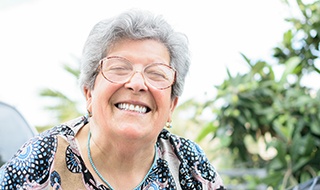 Woman smiling outside