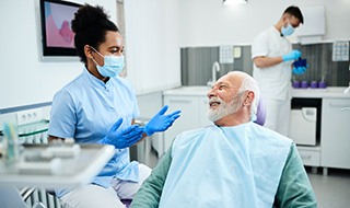 Man talking to a dentist