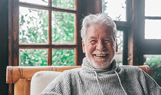 Smiling man with dentures