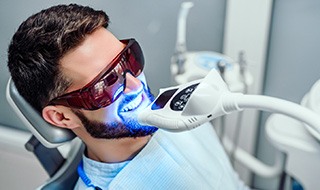 Man having his teeth whitened